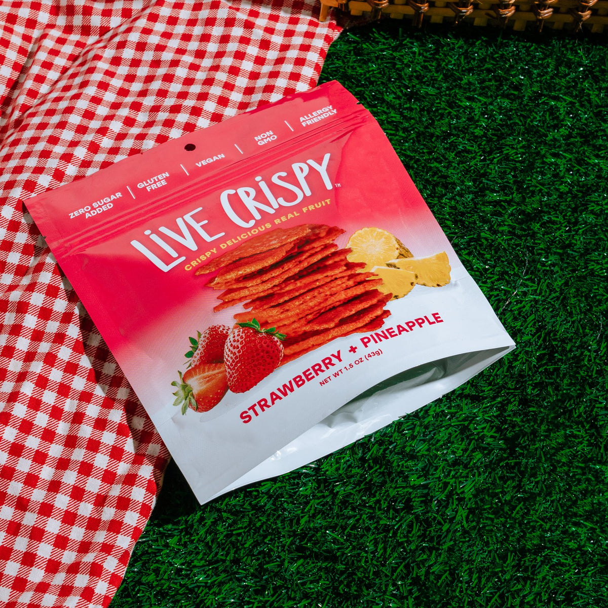Strawberry and Pineapple bag on a picnic blanket