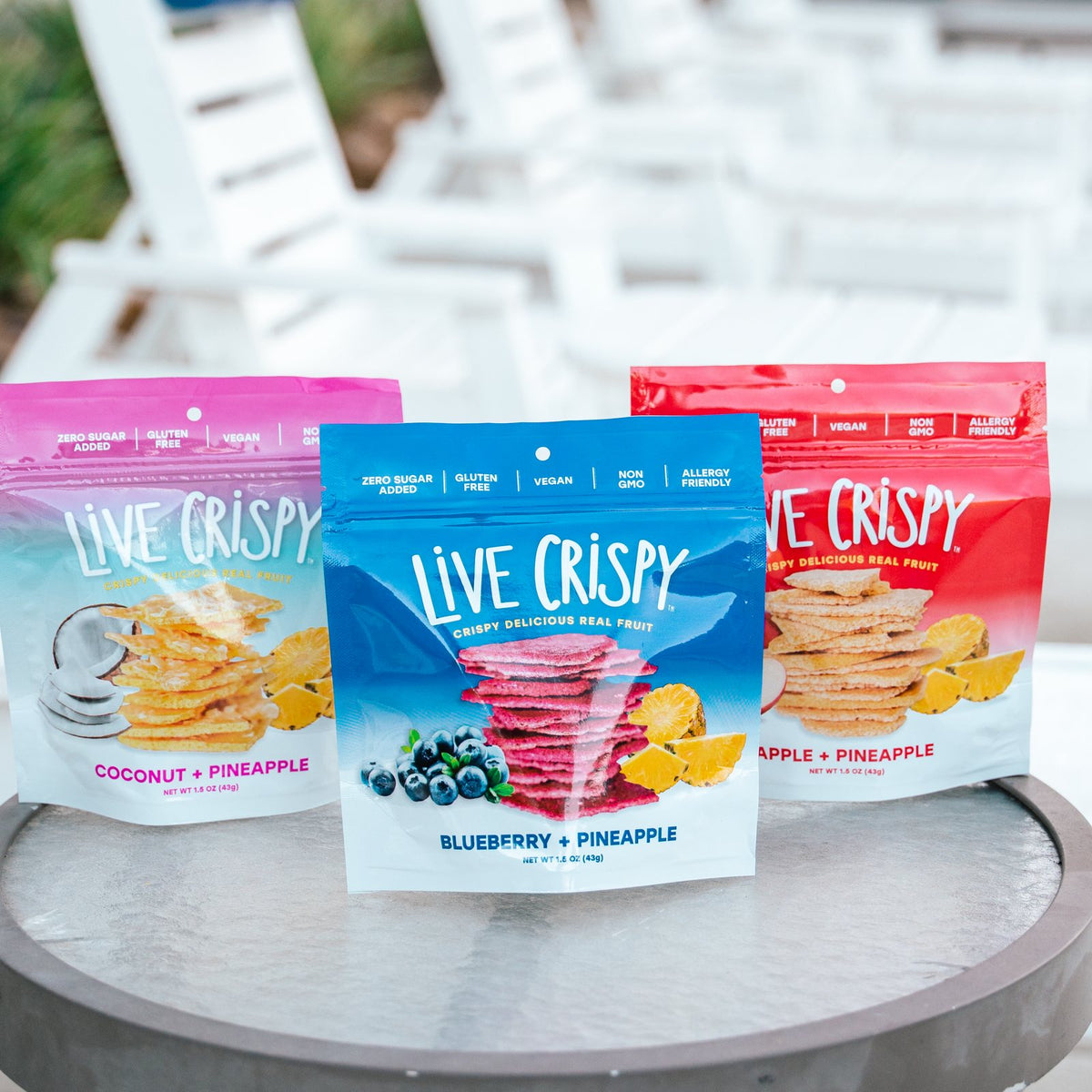 Coconut, Blueberry and Apple bags on a patio table